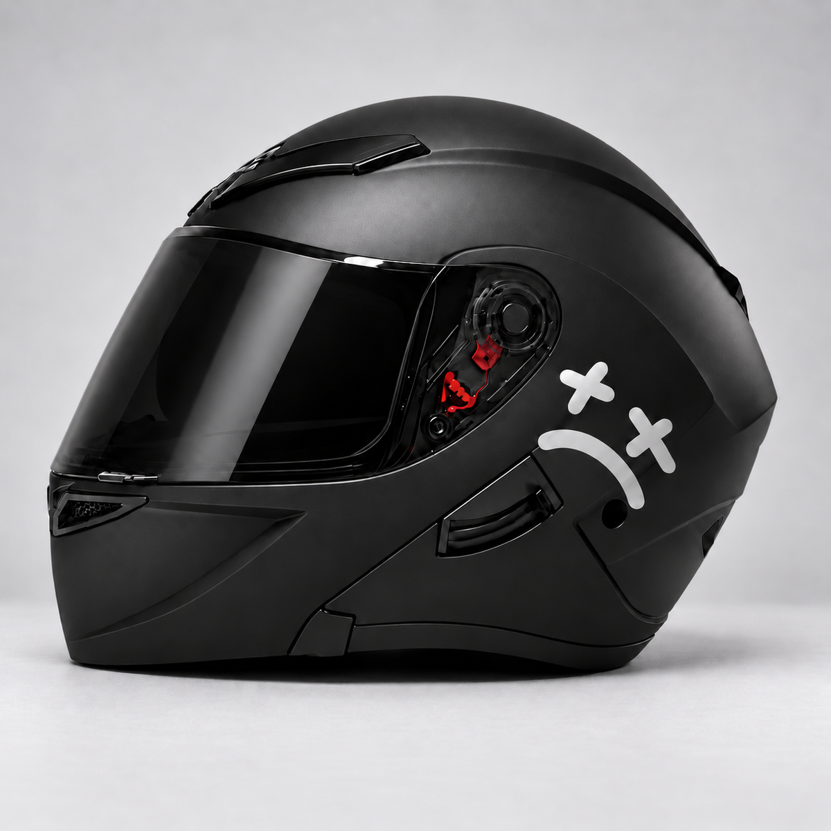 Notobyn sad-face sticker - side helmet view
